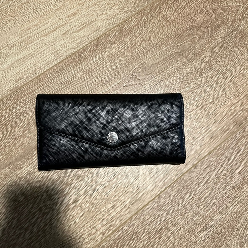 Michael Kors Stylish Black Wallet with Silver Accent and Pink Interior